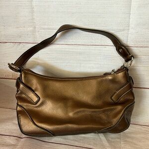 Crazy horse by Liz Claiborne.  Golden purse.  Zippers work.